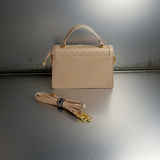 Elegant cream satchel handbag with structured silhouette