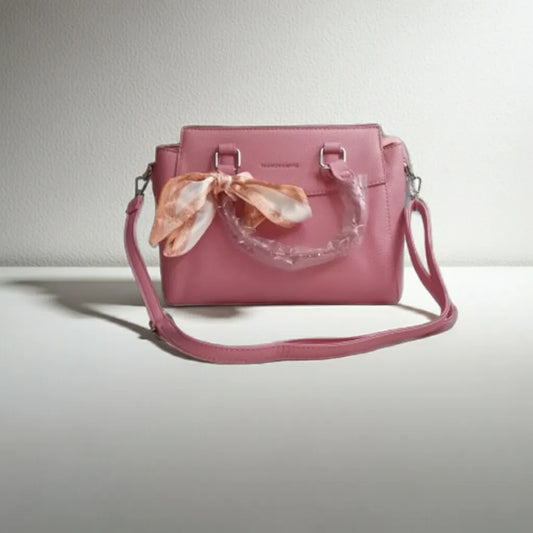 Pink handbag with a floral silk scarf