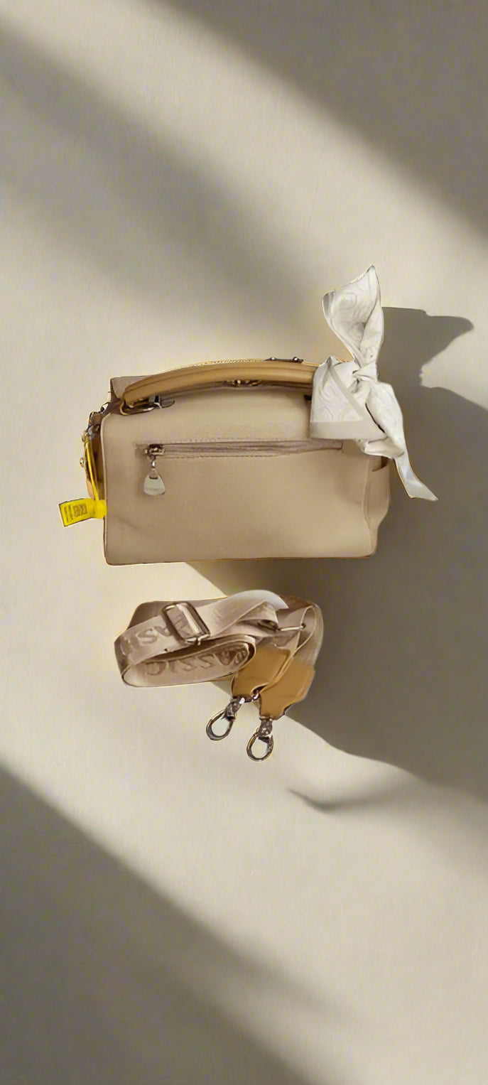 beige satchel with bow