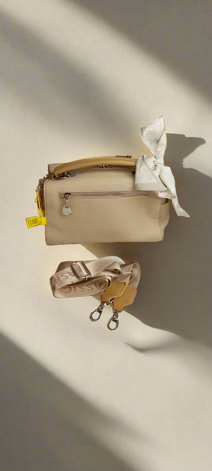 beige satchel with bow