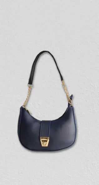 Navy blue handbag with a gold clasp on a light gray background