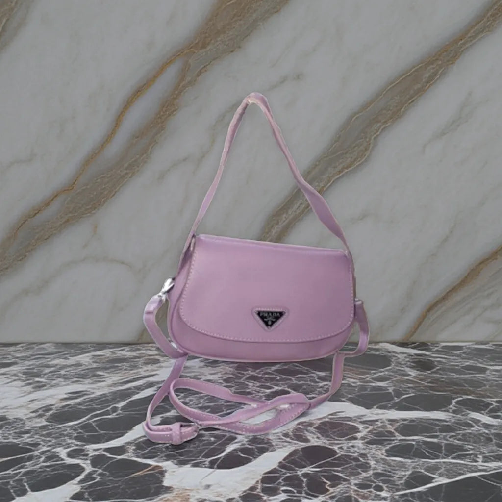 purple handbag on a marble surface