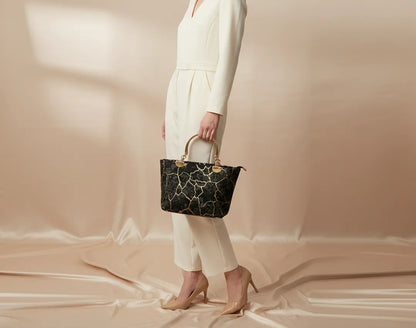 Stylish black velvet handbag with marble pattern Pakistan