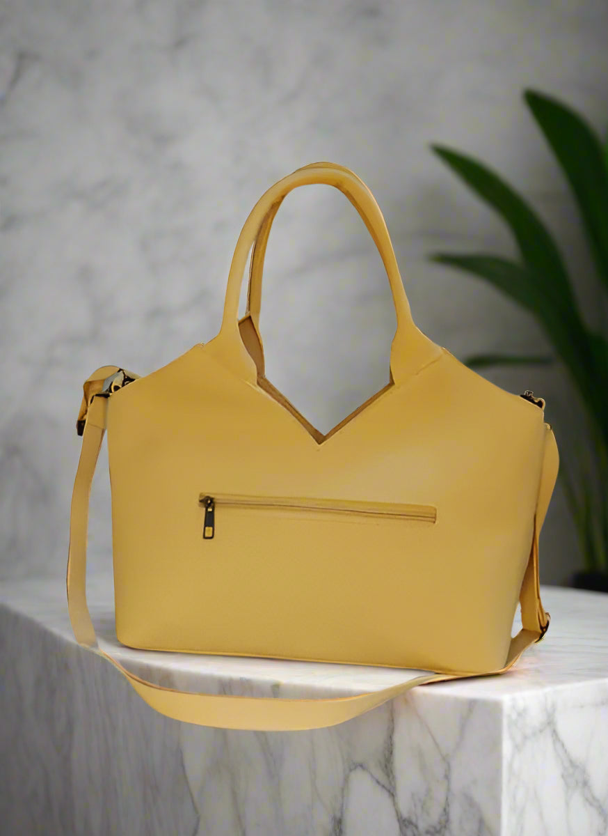 Yellow handbag with a strap back side 