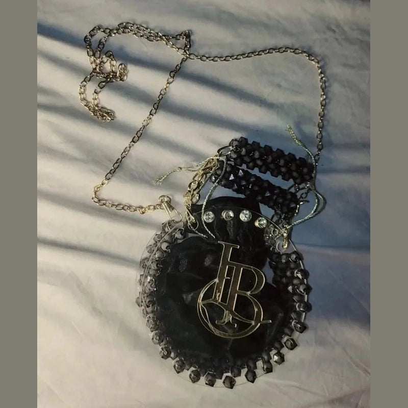 Necklace with a decorative pendant on a textured surface